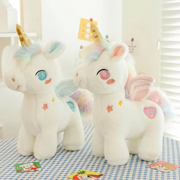 Peluche licorne féérique arc-en-ciel