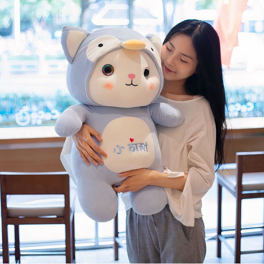Peluche chat déguisé en pingouin