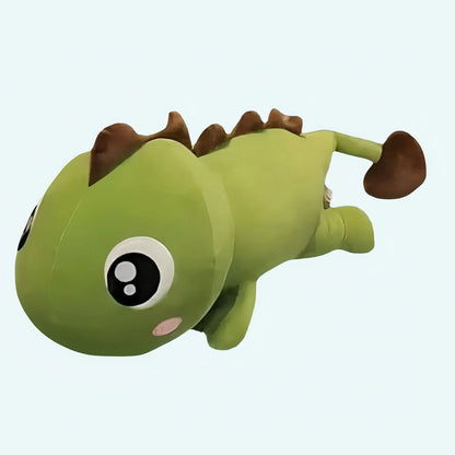Kawaii green dinosaur plush toy with brown spikes and large cartoon eyes.