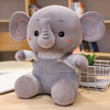Peluche éléphant en salopette colorée