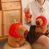 Peluche capybara avec chapeau fraise