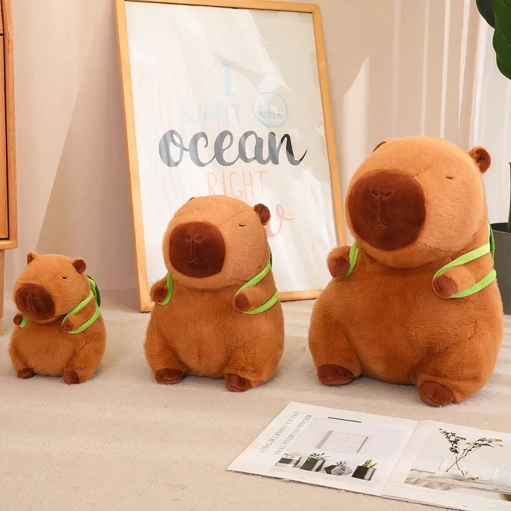 Peluche capybara avec sac à dos tortue