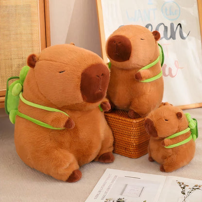 Peluche capybara avec sac à dos tortue