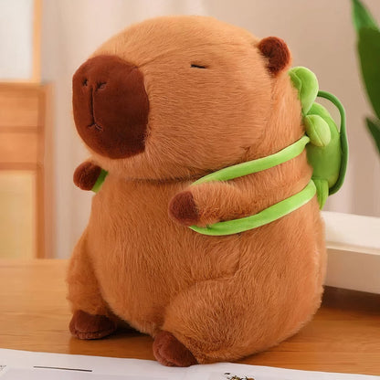 Peluche capybara avec sac à dos tortue
