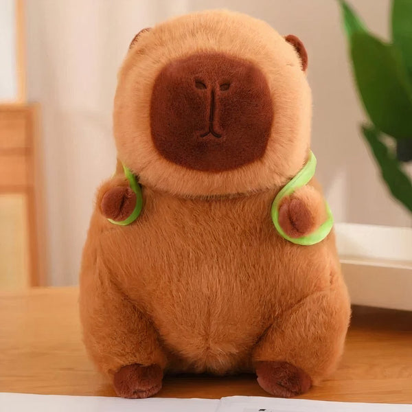 Peluche capybara avec sac à dos tortue