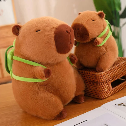 Peluche capybara avec sac à dos tortue