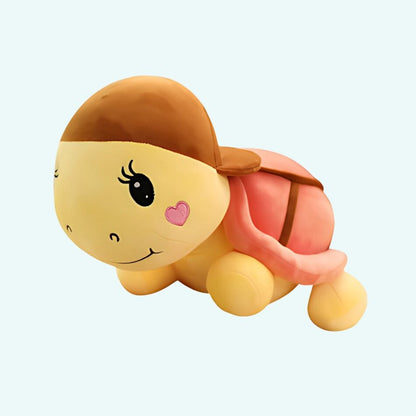Peluche tortue rose à casquette