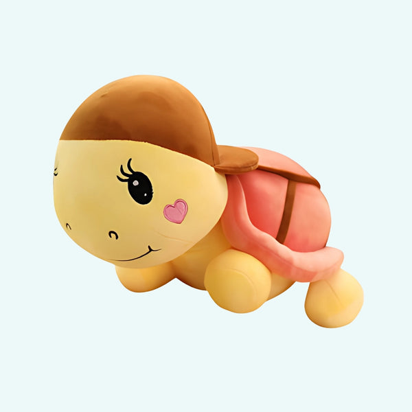 Peluche tortue rose à casquette
