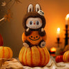 Peluche type Labubu citrouille
