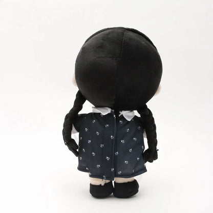 Peluche Mercredi Addams en robe noire à fleurs