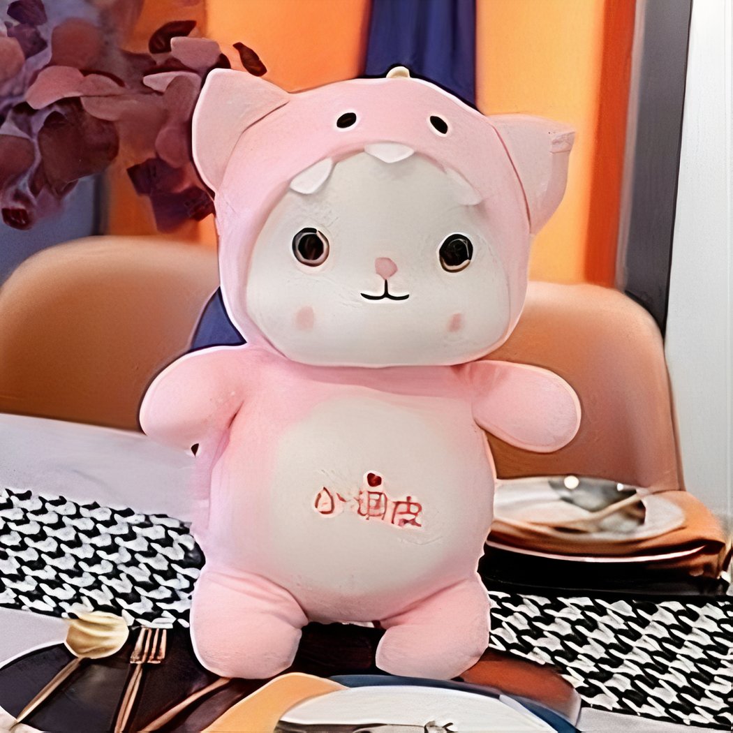 Peluche chat déguisé en dinosaure