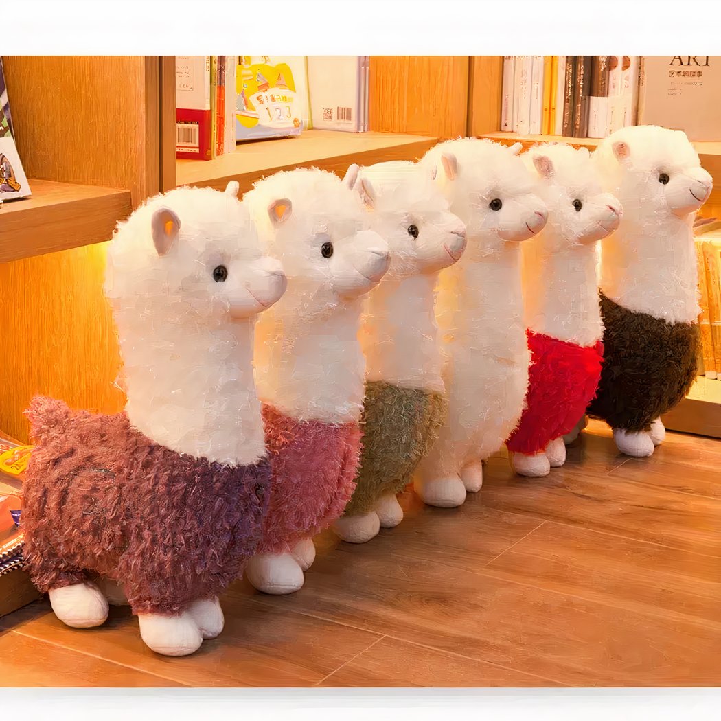 Peluche alpaga à robe colorée