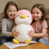 Peluche pingouin rose souriant
