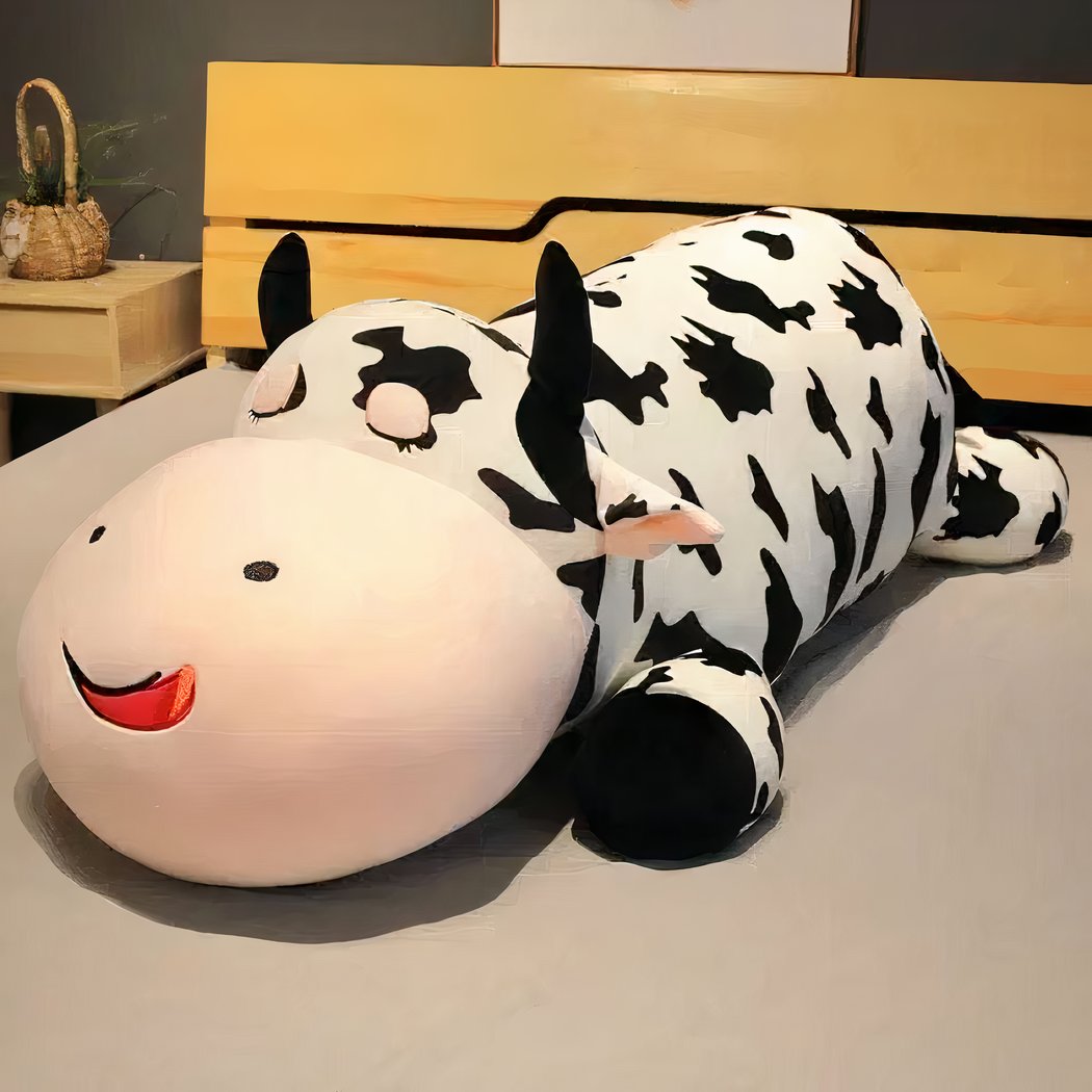Peluche vache allongée