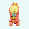 Peluche Winnie l'Ourson dans sa couverture