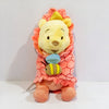 Peluche Winnie l'Ourson dans sa couverture