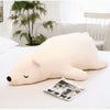 Peluche ours blanc qui dort