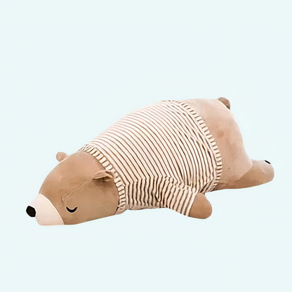 Peluche ours marron habillé qui dort
