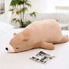 Peluche ours marron qui dort