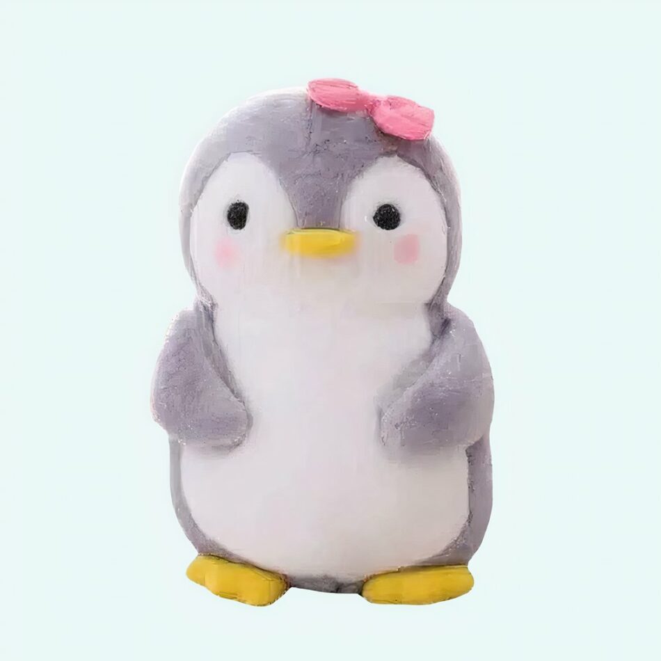 Peluche pingouin nœud rose