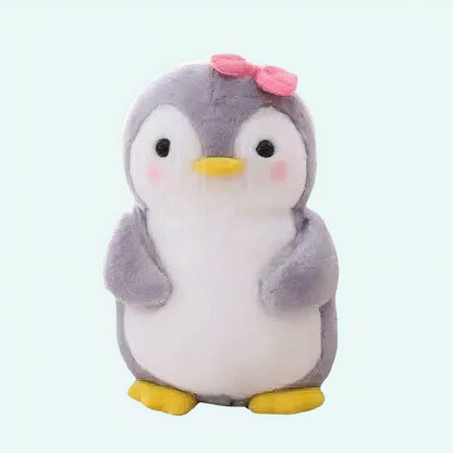 Peluche pingouin nœud rose