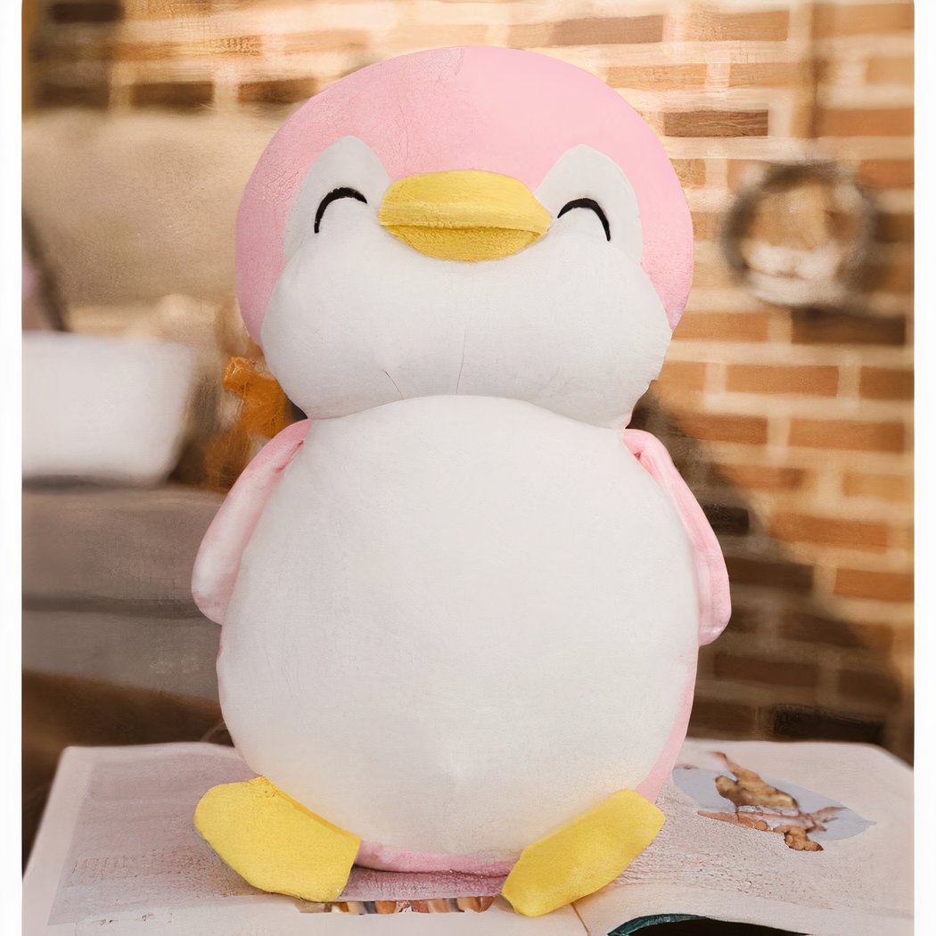 Peluche pingouin rose souriant