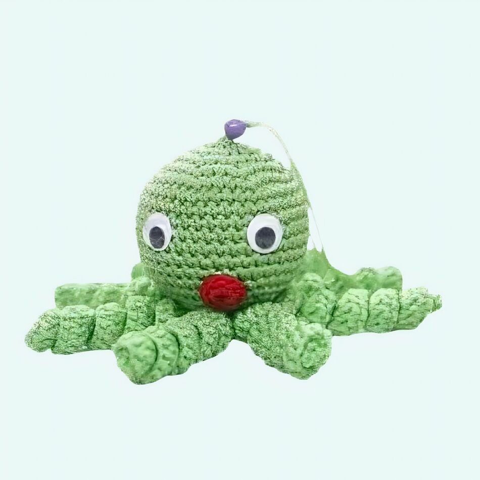 Peluche poulpe verte douce tressée pour enfant