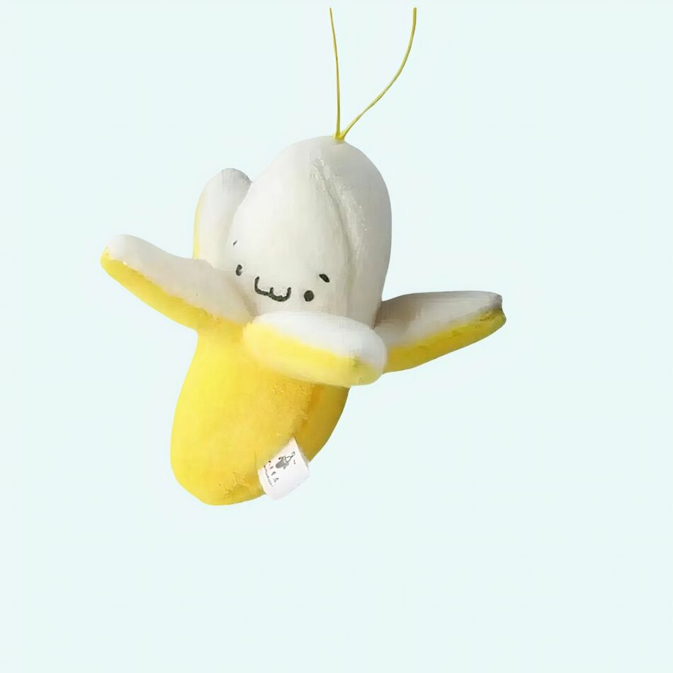 Peluche banane jaune épluchée
