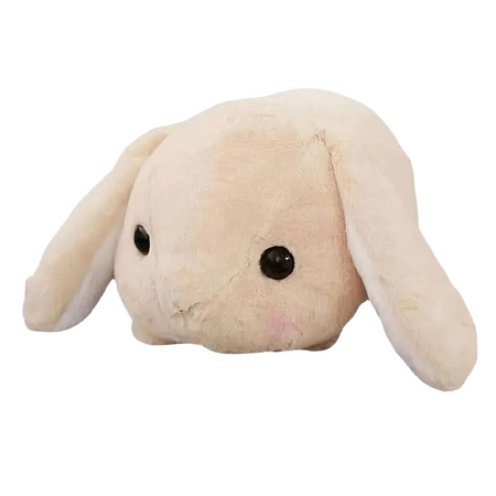 Peluche lapin beige couché