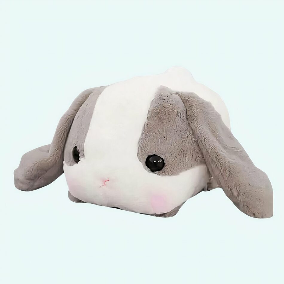 Peluche lapin gris couché