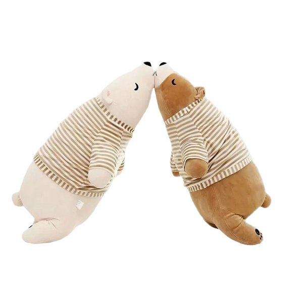 Peluche ours blanc habillé qui dort