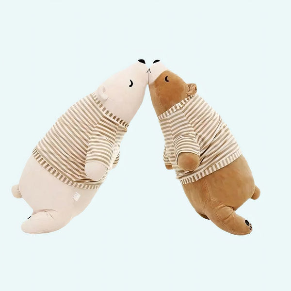 Peluche ours blanc habillé qui dort