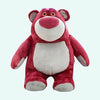 Giant pink Lotso Toy Story plush bear with white belly.