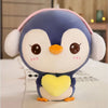 Peluche pingouin bleu avec cache oreilles