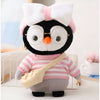 Peluche pingouin pull rose