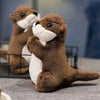 Petite peluche loutre en prière