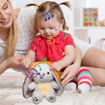Peluche lapin carotte qui respire avec berceuses