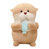 Soft otter plush holding a pale blue fish