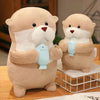 Two beige otter plushies, each holding a light blue fish toy, on a wooden table.