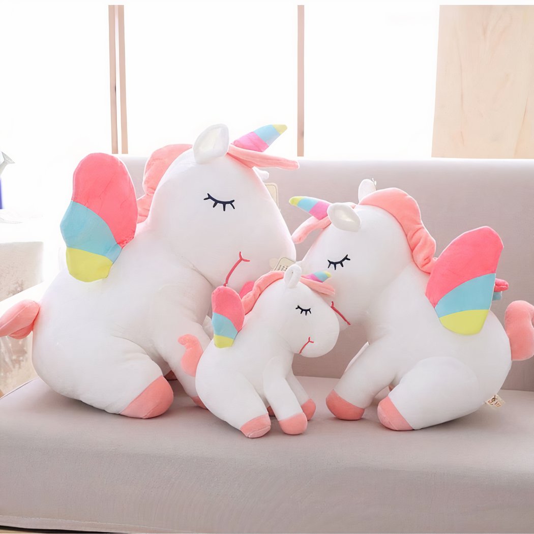 Peluche licorne blanche arc-en-ciel