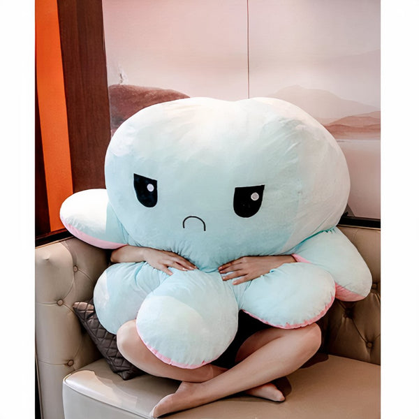Peluche géante pieuvre réversible visage content et pas content
