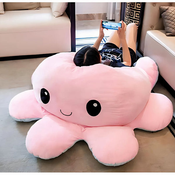 Peluche géante pieuvre réversible visage content et pas content