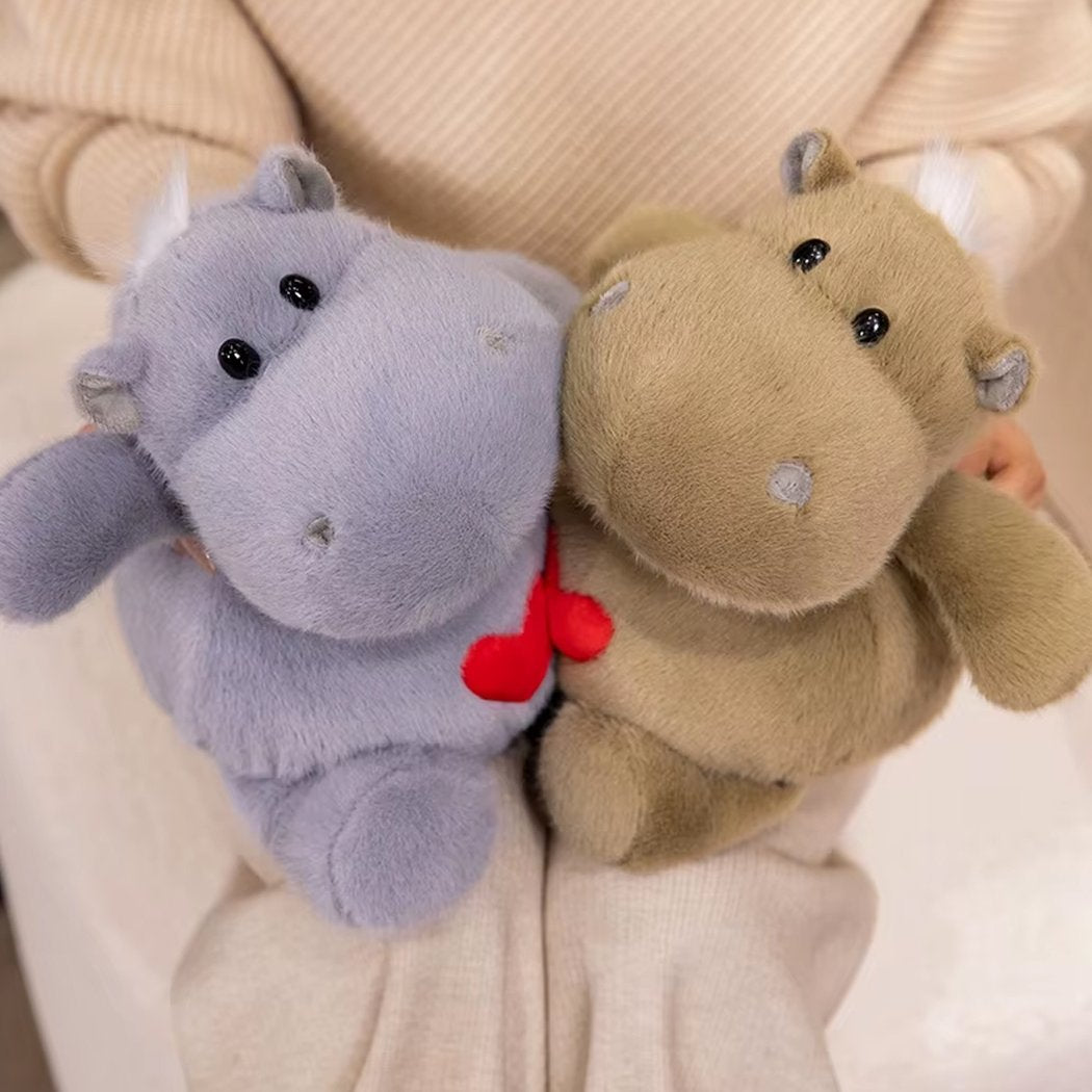 Peluche hippopotame avec un coeur