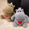 Peluche hippopotame avec un coeur