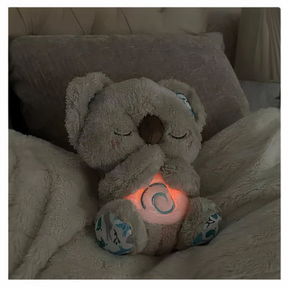 Peluche koala qui respire avec berceuse apaisante
