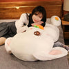 Peluche lapin tenant une carotte