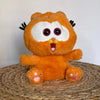 Peluche musicale Garfield avec des gros yeux qui respire