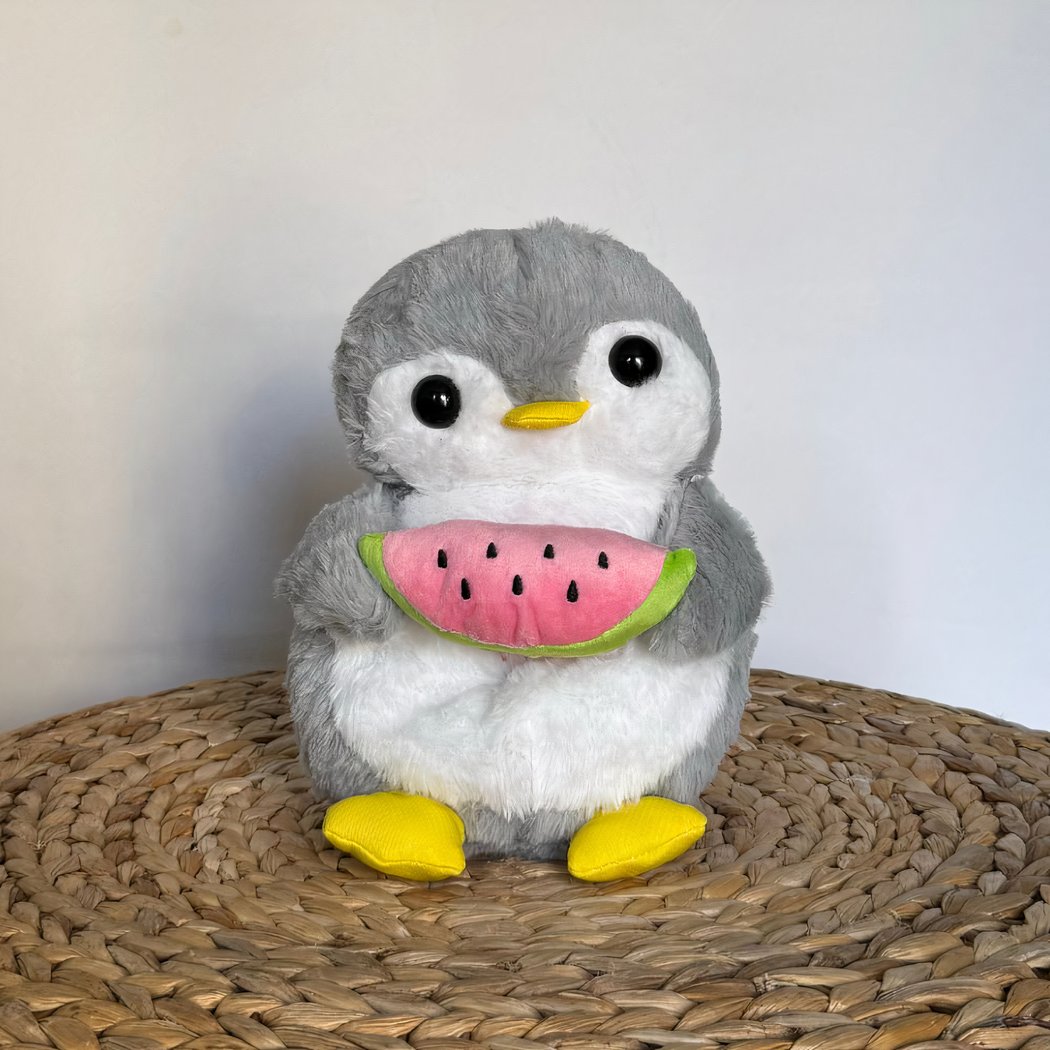 Peluche pingouin qui respire avec berceuses intégrées