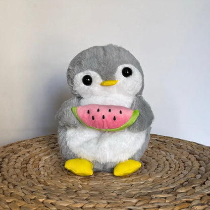 Peluche pingouin qui respire avec berceuses intégrées