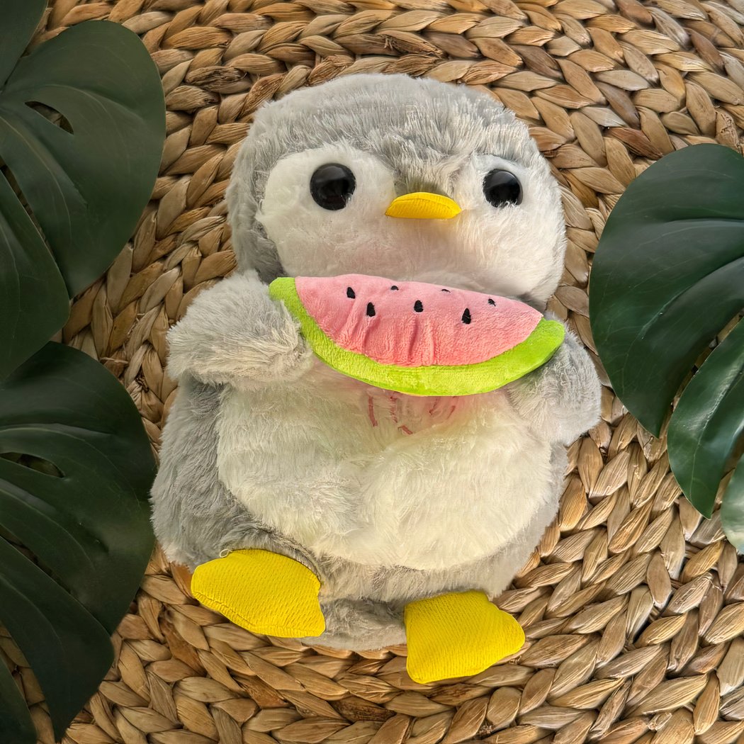 Peluche pingouin qui respire avec berceuses intégrées